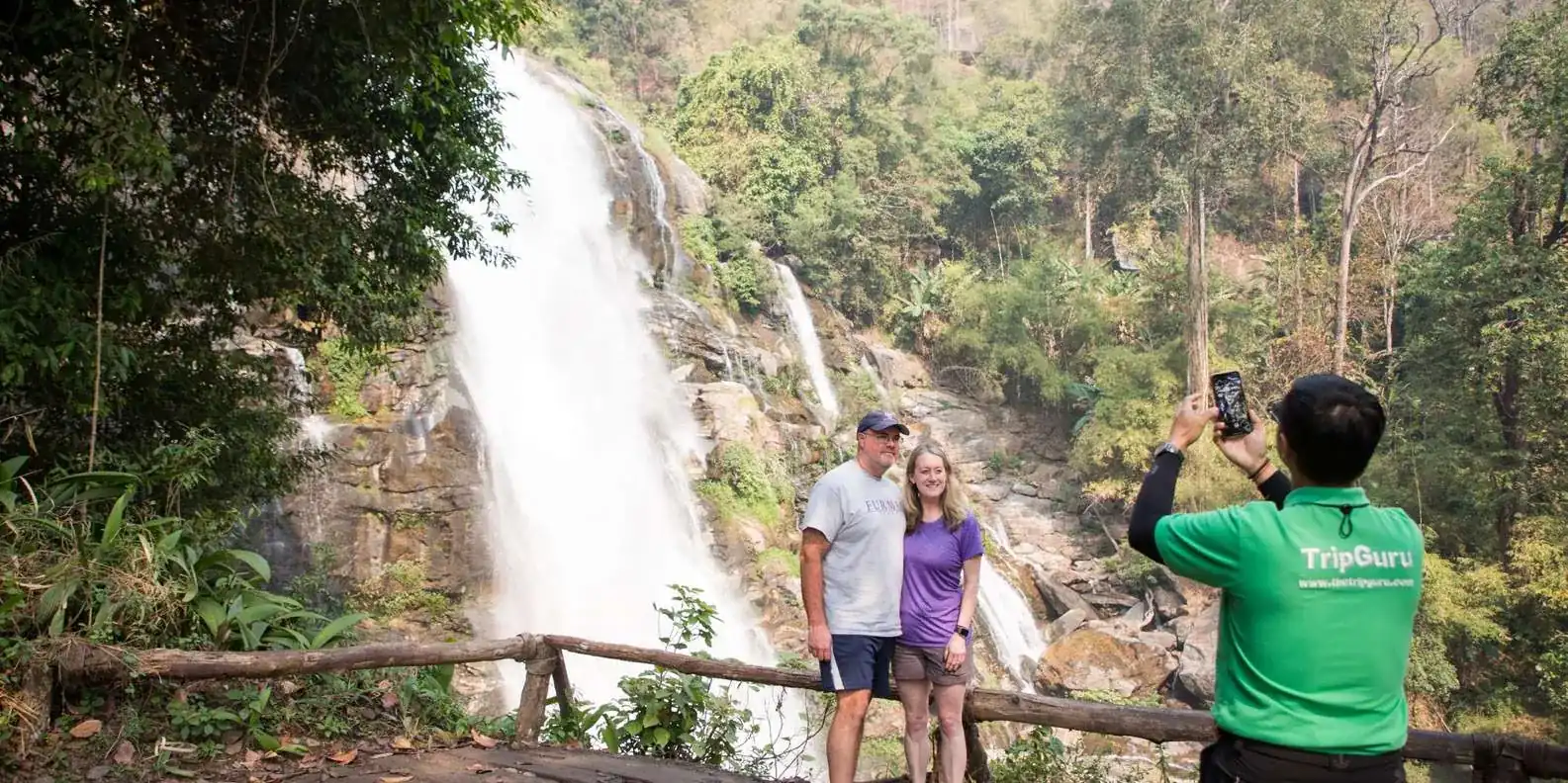 Visitors photographing Wachirathan Waterfall
